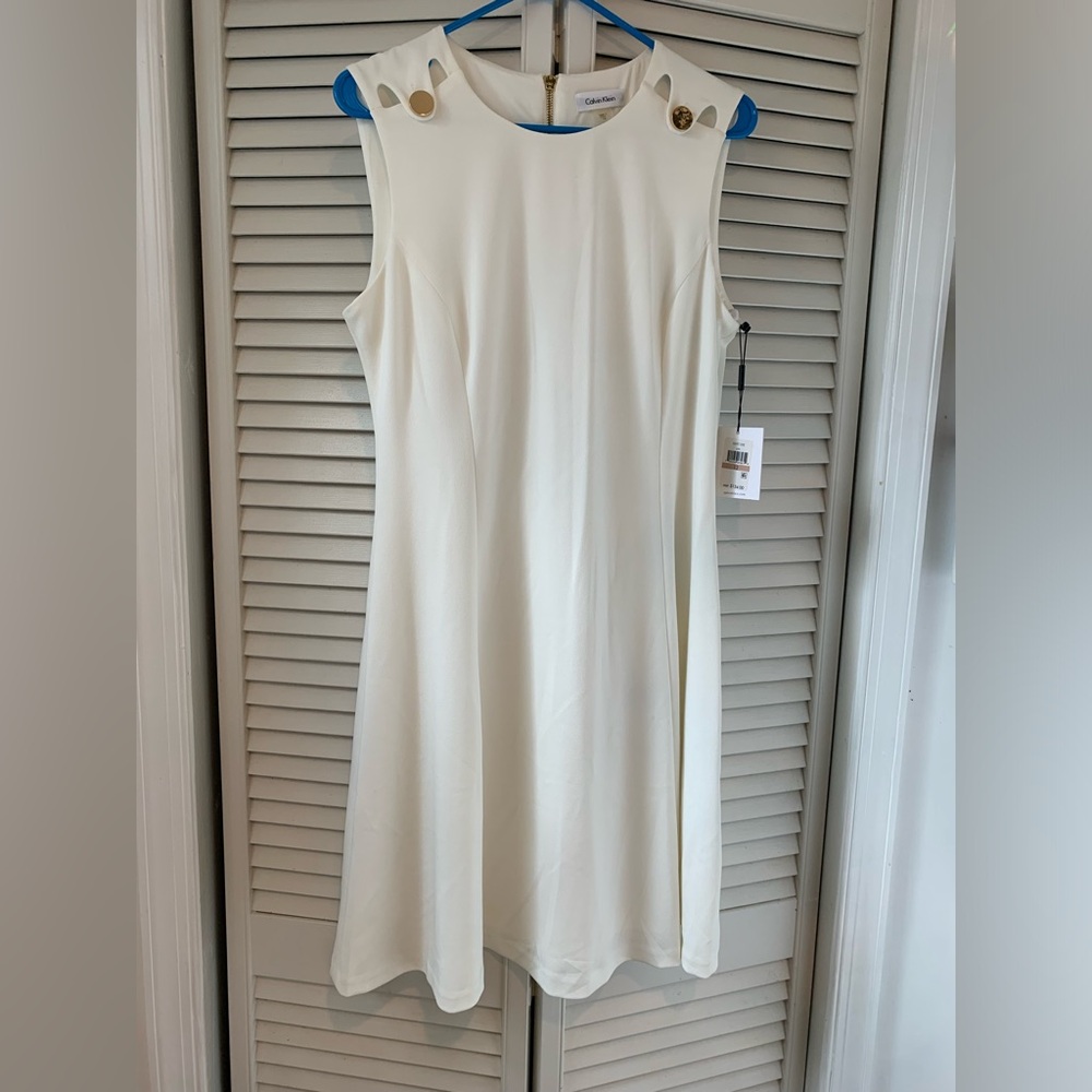 White Calvin Klein dress that has never been worn. Size 12